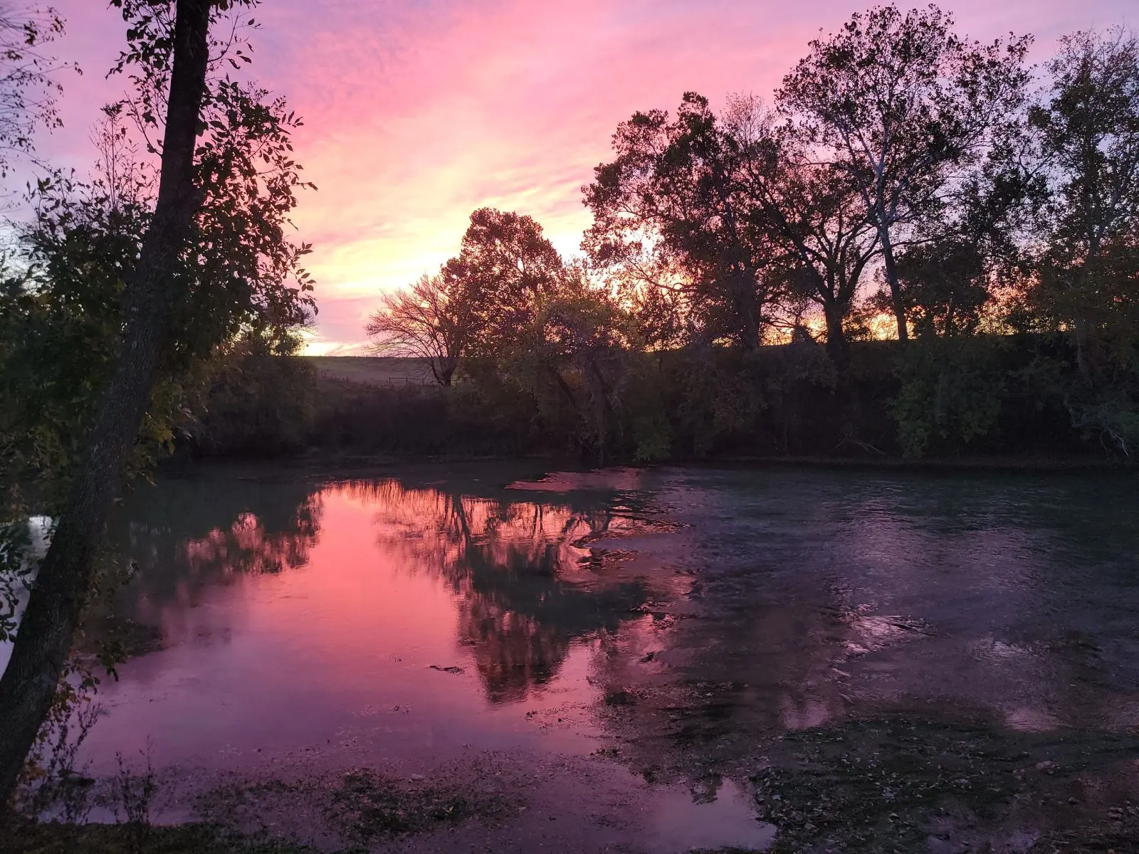 Image of sunset sky, reflecting on the Colorado River